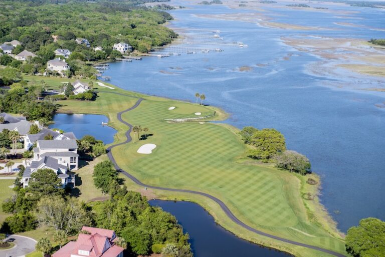 Aerial perspective of Oak Point Golf Course on Kiawah Island, with waterways and marshland surrounding the green.