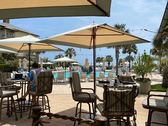 Relax at Loggerhead Grill on Kiawah Island, a recommended poolside bar and grill perfect for casual dining.